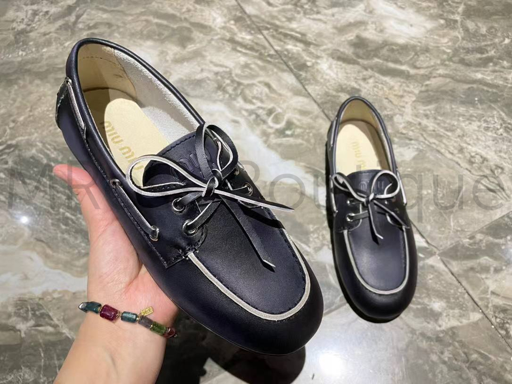 Женские лоферы Miu Miu с шнурком черного цвета