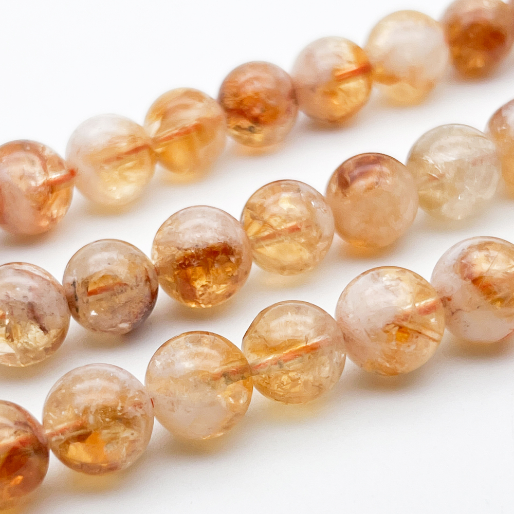 "Цитрин" бусины (кварц), диаметр 10,3-10,7 мм, цена за 9 шт (1/4 нити)