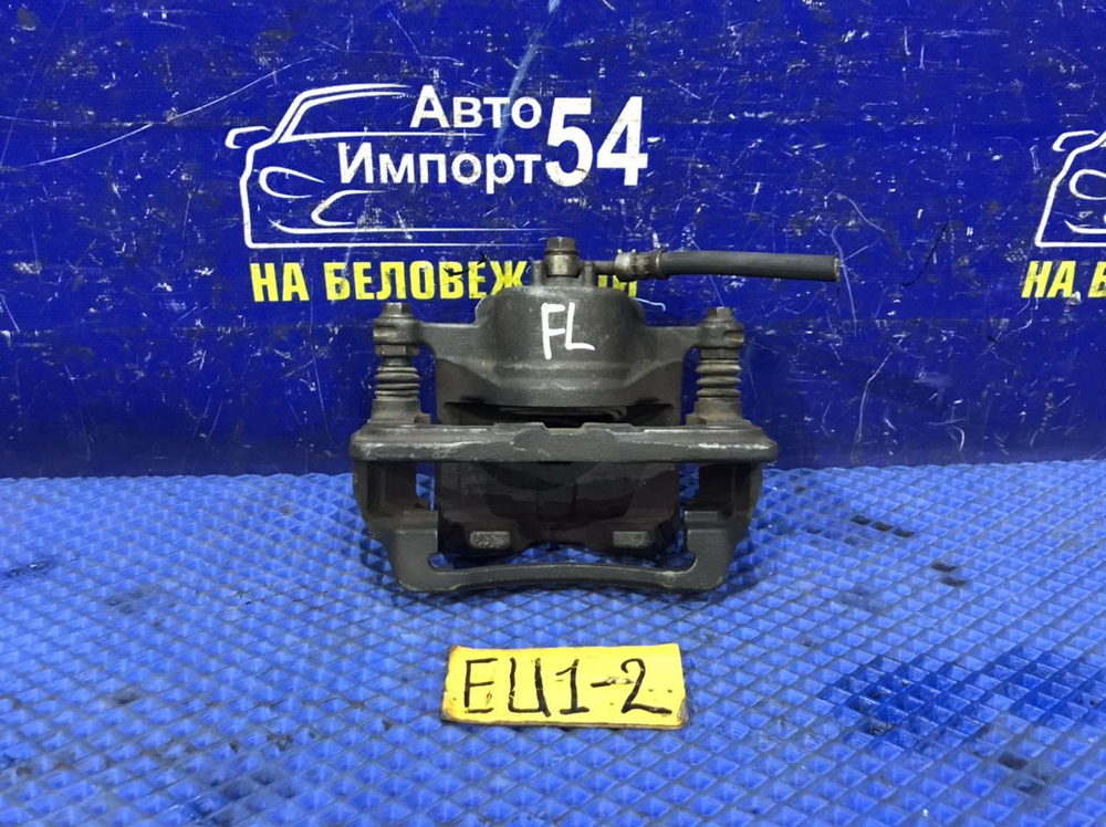 Суппорт тормозной передний левый Honda CIVIC 2001