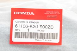 61106-K20-900ZB. GARNISH, L. FR. FENDER *NH1*