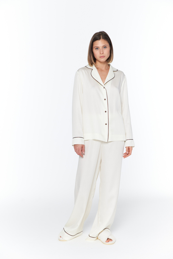 Брюки из тенселя с кантом айвори