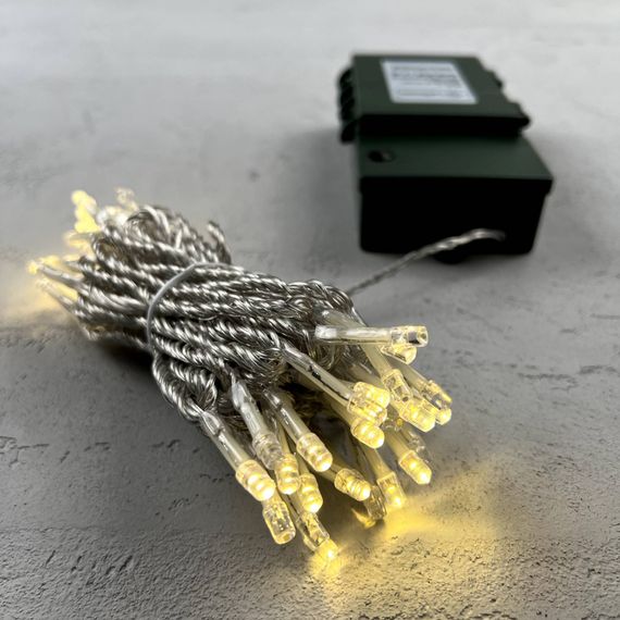 Светодиодная гирлянда 5 м., 3 батарейки типа D 4.5V, 50 LED ламп цвета шампань, таймер, прозрачный провод, LTC (EST50-4W10-8CH)