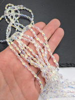 Бусины стеклянные рис 5.5*3.5мм, прозрачный АВ