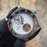 Часы Corum