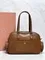 Женская сумка MIU MIU Pocket с верхней ручкой из кожи nappa, коричневая