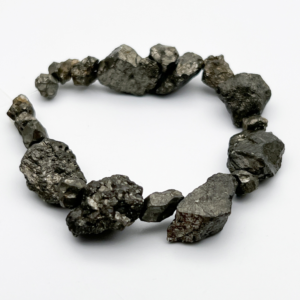 Пирит необработанный бусины, размер около 5-15 мм, цена за отрезок 15 см