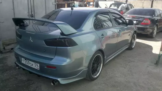 Юбка заднего бампера Zodiak var.2 для Mitsubishi Lancer 10 (под раздвоенный выхлоп)