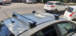 Багажник  LUX с дугами 1,1 м крыло для Opel Astra J штатные места Sd/Hb 2009-2015 г.в.