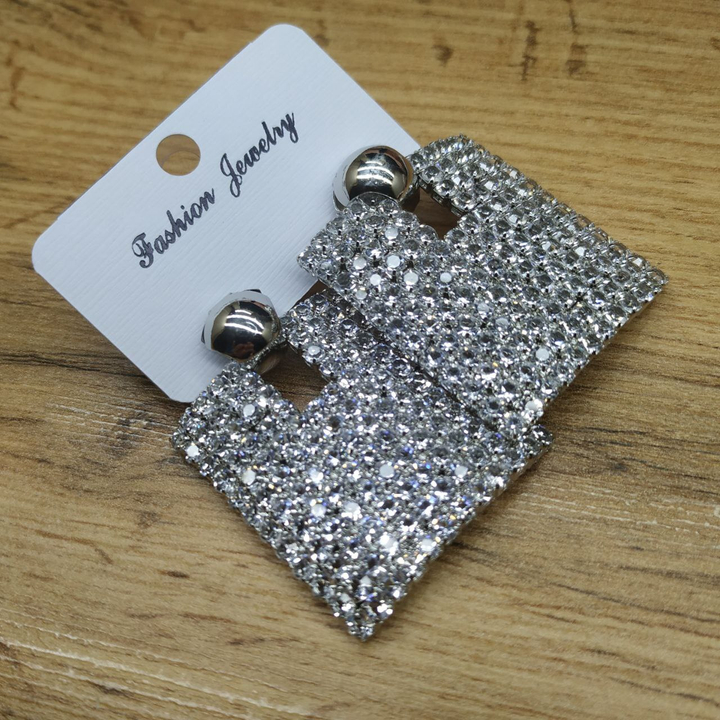Серьги-гвоздики Royal полукруг подвеска квадрат 12 х 12 кристаллов с прорезью металл серебристый