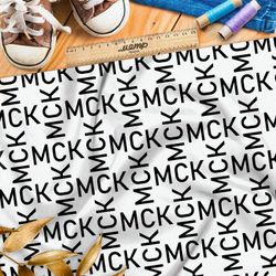 Ткань поплин узор из чёрных букв на бежевом фоне