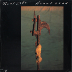 Real Life / Heartland (LP)