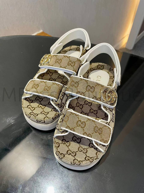 Женские сандалии Gucci GG коричневого цвета с узорами