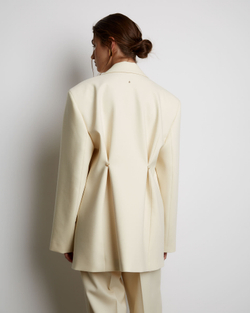 Жакет с дополнительными петлями из шерсти молочный