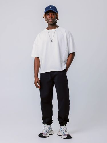 Черные мужские спортивные брюки с поясом на резинке и манжетами