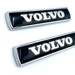 Шильд Volvo объемный металлический (наклейка Вольво, 7,5х1,5см). 2 шт в комплекте. Черный цвет с серебристой надписью