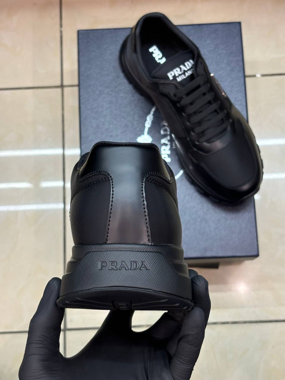 Кроссовки Prada
