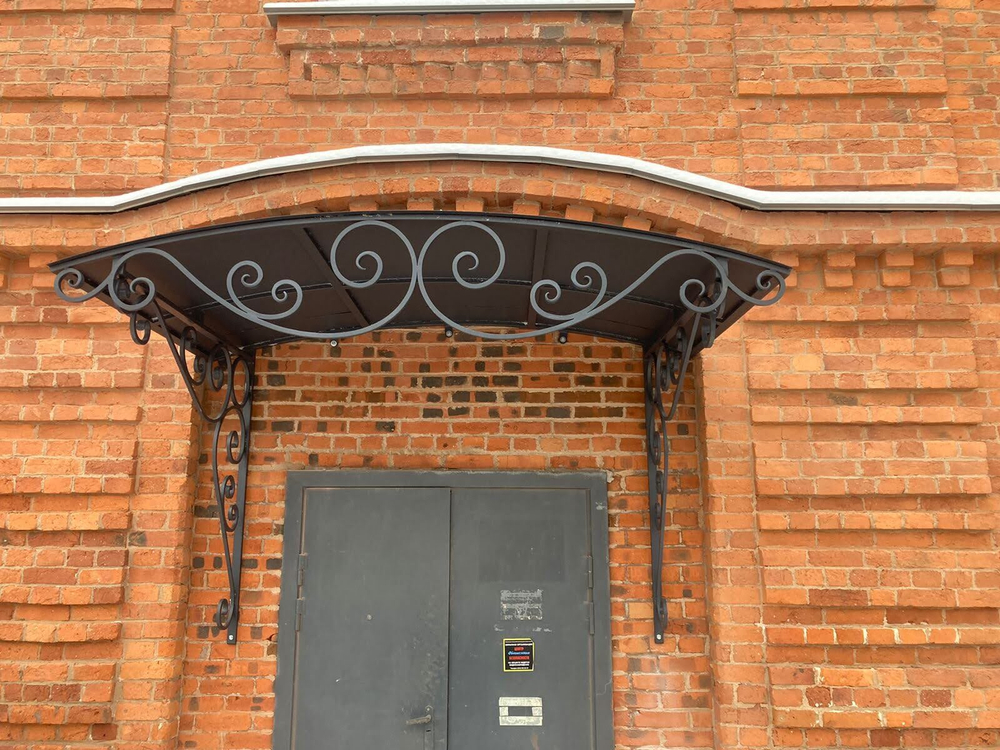 Изготовление кованых козырьков