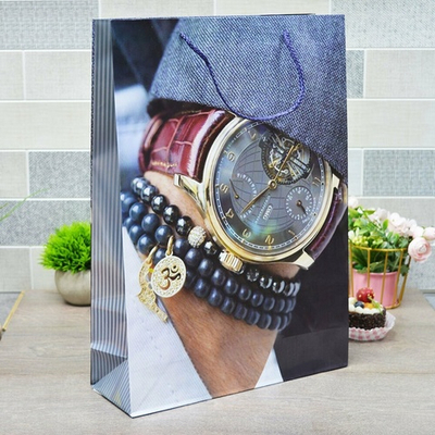 Пакет бумажный 33*45*11см с ручками глянцевый "Мужской" микс