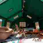 Пневмокаркасная всесезонная палатка «Тёплая Искра» 3,6×4,8×2,2 м — с печкой, из ПВХ, зелёная