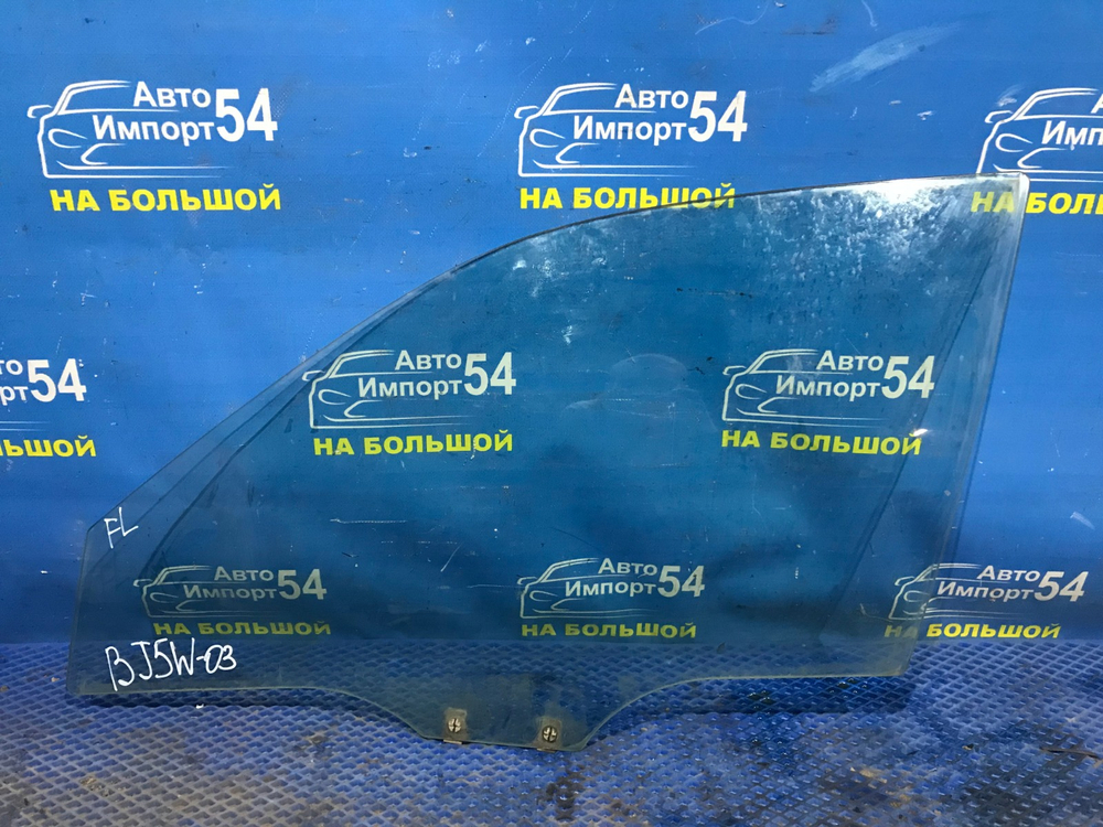 Стекло двери передней левой MAZDA FAMILIA 2001