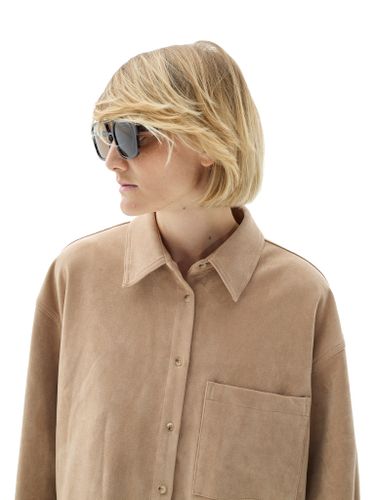 Бежевая рубашка из эко-замши