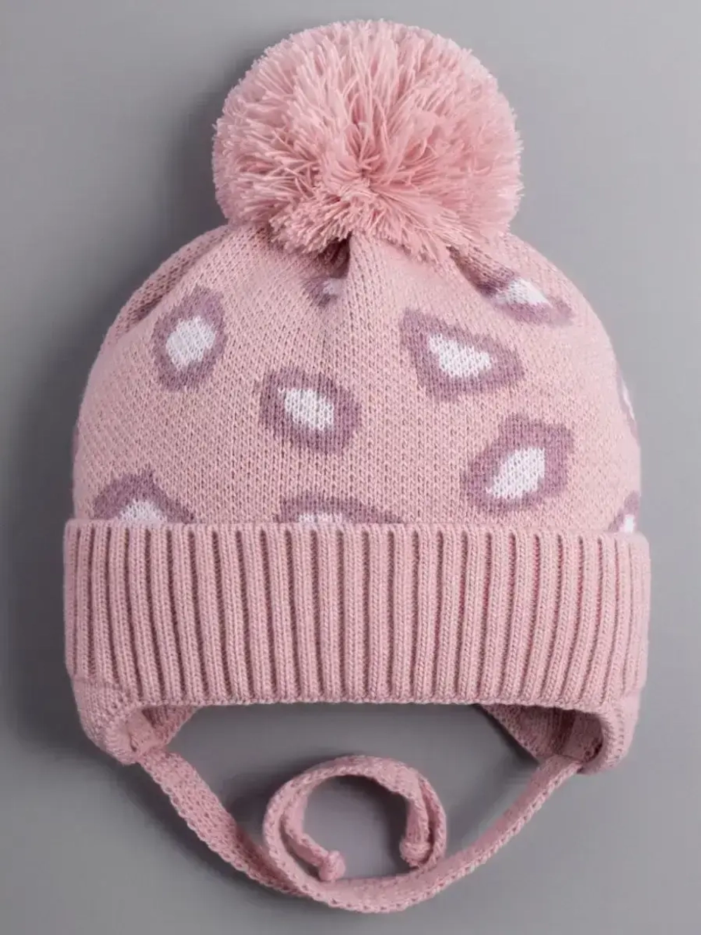 Шапка для девочки на завязках на осень