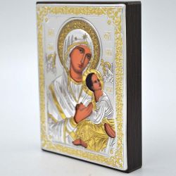 Икона Богородицы "Неустанной помощи" в серебряном окладе.