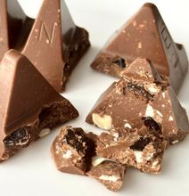 Toblerone шоколад молочный с изюмом и орехом 100 г
