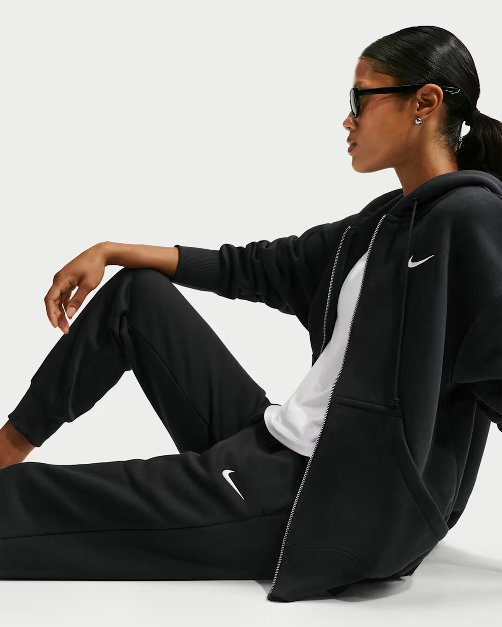 Nike Sportswear Phoenix Fleece Женские спортивные штаны с зауженным кроем - NIKE