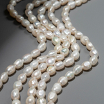 Жемчуг культивированный овальный белый, 9-10*7-8мм