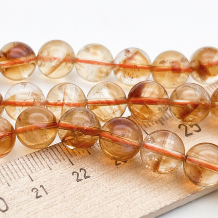 "Цитрин" бусины (кварц), диаметр около 9,6-9,7 мм, цена за 10 шт (1/4 нити)