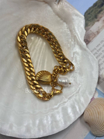 Массивный золотистый браслет цепь с ракушкой и жемчужиной