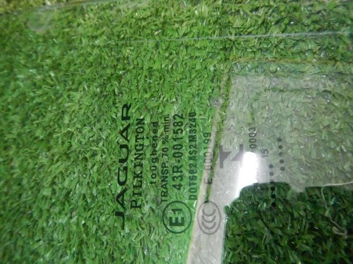 Стекло двери заднее левое Jaguar XF (2007-2015)