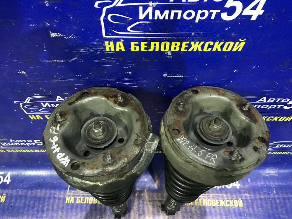 Стойка передняя левая NISSAN PRIMERA 1997