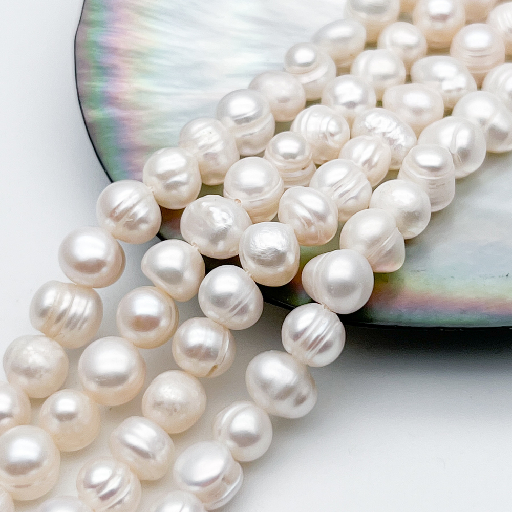 Жемчуг, размер около 6,5-8 мм, цена за отрезок 25-26 шт (около 16 см)