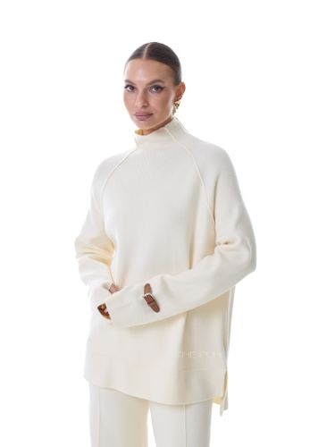 Трикотажный костюм с брюками молочного цвета