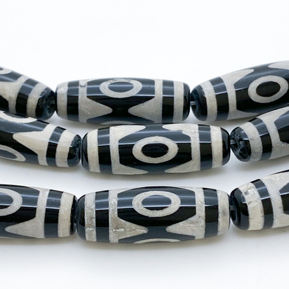 "Дзи" 3 Глаза, размер около 30*10 мм, цена за 1 шт