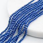 Фианит "матовый" (кубический цирконий), цвет синий, размер около 2 мм, цена за нить 38 см