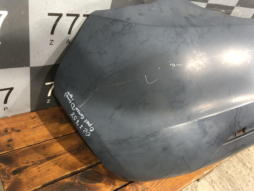 Бампер задний Opel Astra J 09-12 Новый Оригинал 13278378