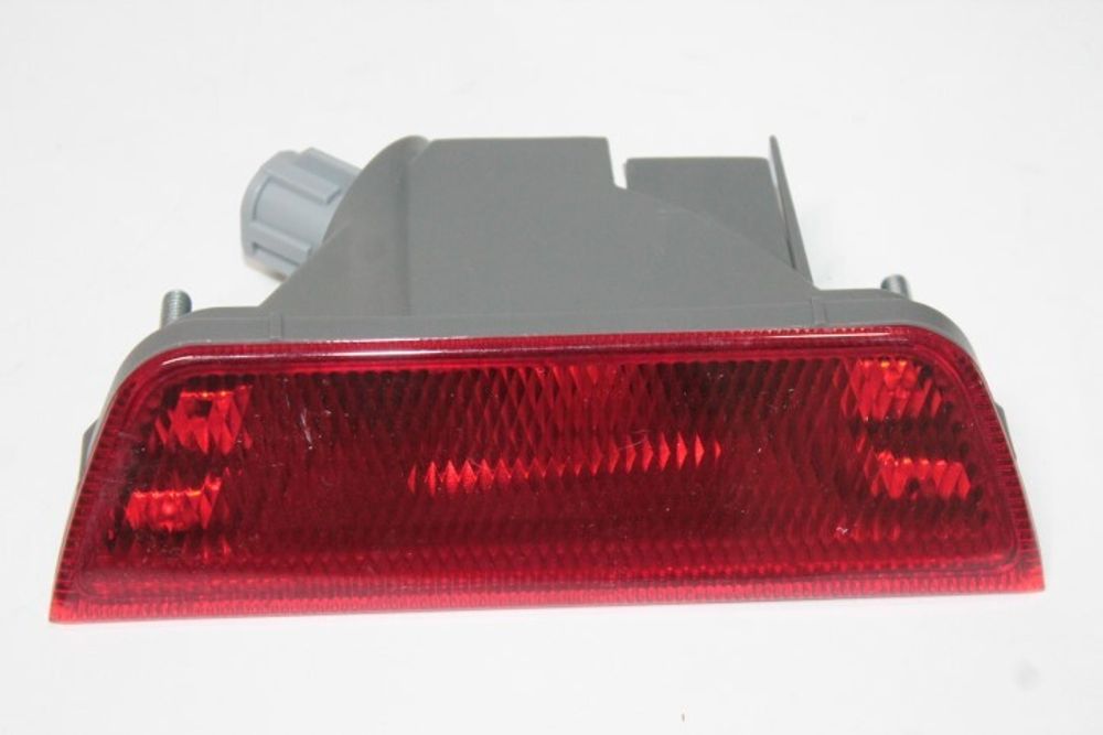 Катафот задн. бампера Nissan Almera с 2013 г. центр. (COMPONENT)