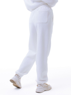 Белые спортивные брюки оверсайз на резинке
