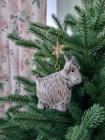 Фарфоровая игрушка козочка серая