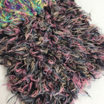 COTTON PELUCHE; 95% хлопок, 5% п/а; 260м/100 гр; цвет: На черной нити фиолетовые, синие и светло-коричневые хвостики; Травка Есть мал. бобинка 304гр.