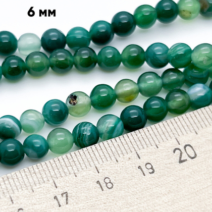 Агат тонированный зеленый, диаметр 6,2-6,3 мм, цена за 29-30 шт (1/2 нити)