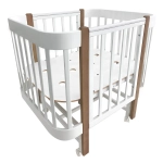 Кровать детская Indigo Italiano Baby продольный маятник на колесах белый-натуральный