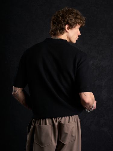 Черная трикотажная рубашка Laine с коротким рукавом