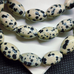 Порфир (яшма далматиновая), бусины овальные 12×8мм