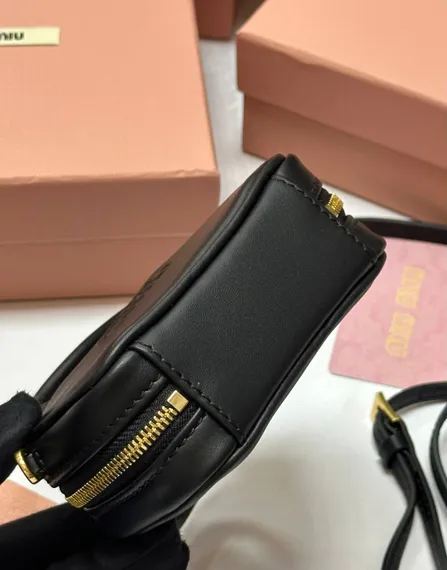 Мини сумка MIU MIU из натуральной кожи в черном цвете