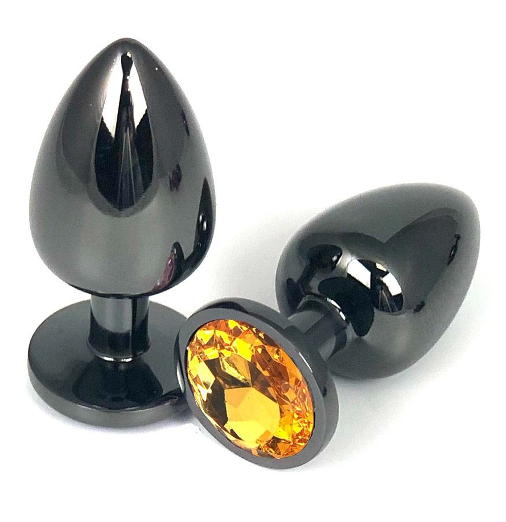 Черная металлическая анальная пробка с оранжевым стразом - 7,5 см. (Цвет: оранжевый)