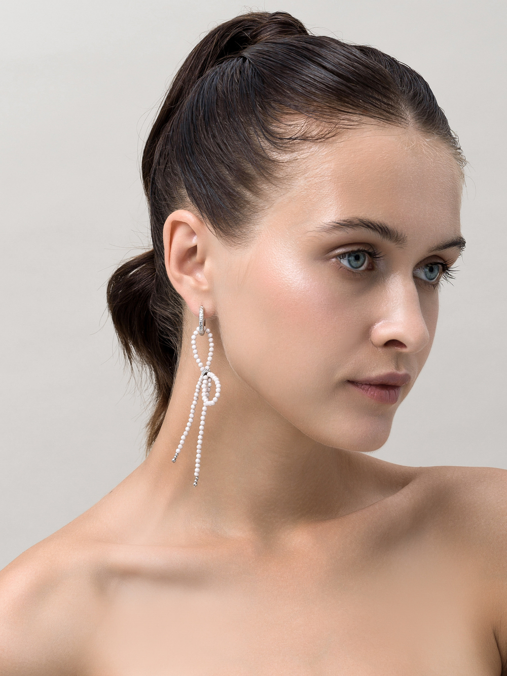 Серьги "Bow Beige Zircon"